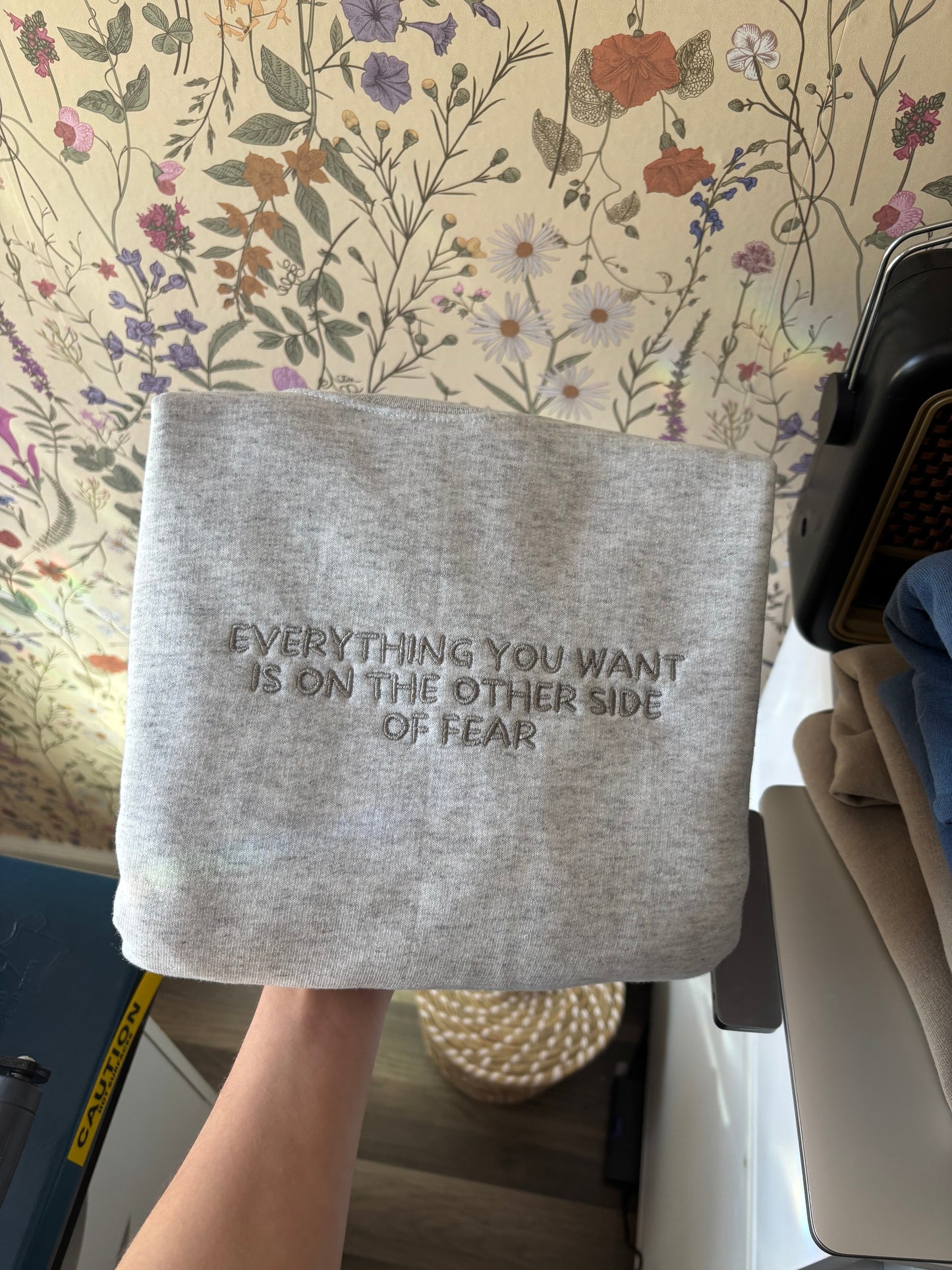 EVERYTHING YOU WANT IS ON THE OTHER SIDE OF FEAR - embroidered crewneck